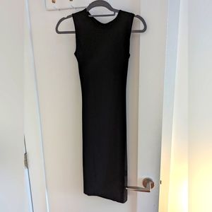 Sexy but subtle black open back knee length dress